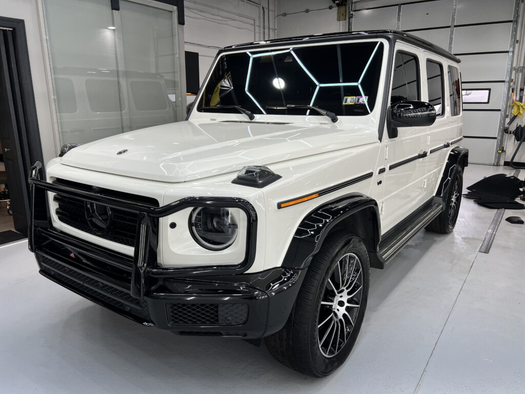 White Mercedes Jeep from driver side front